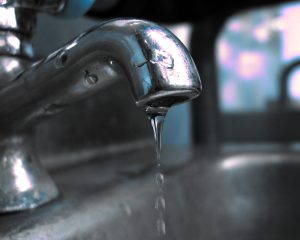 a leaky faucet needs a plumber to repair